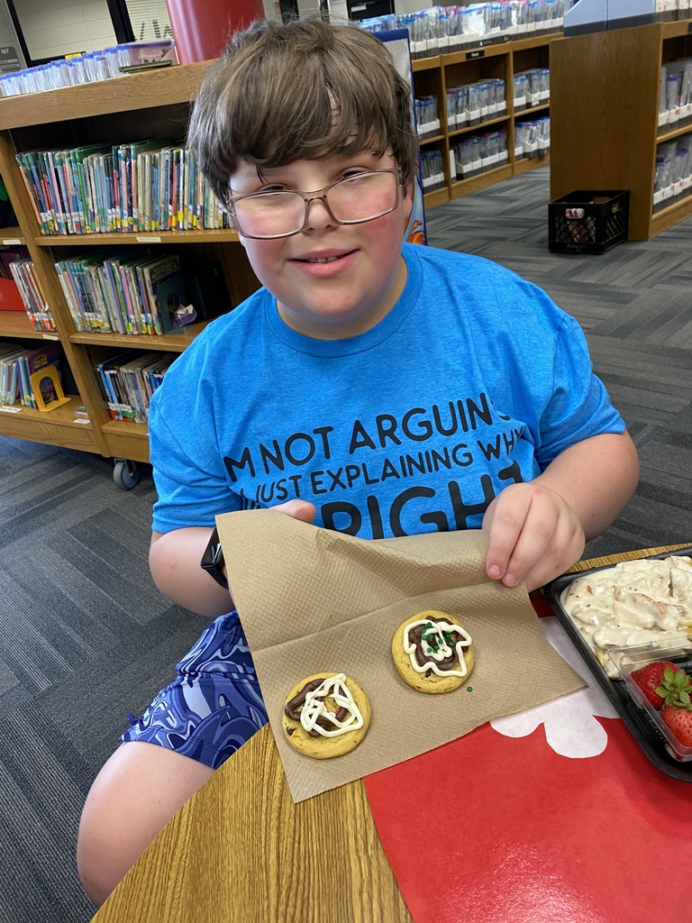 Parker showing off his cookies to the camera.
