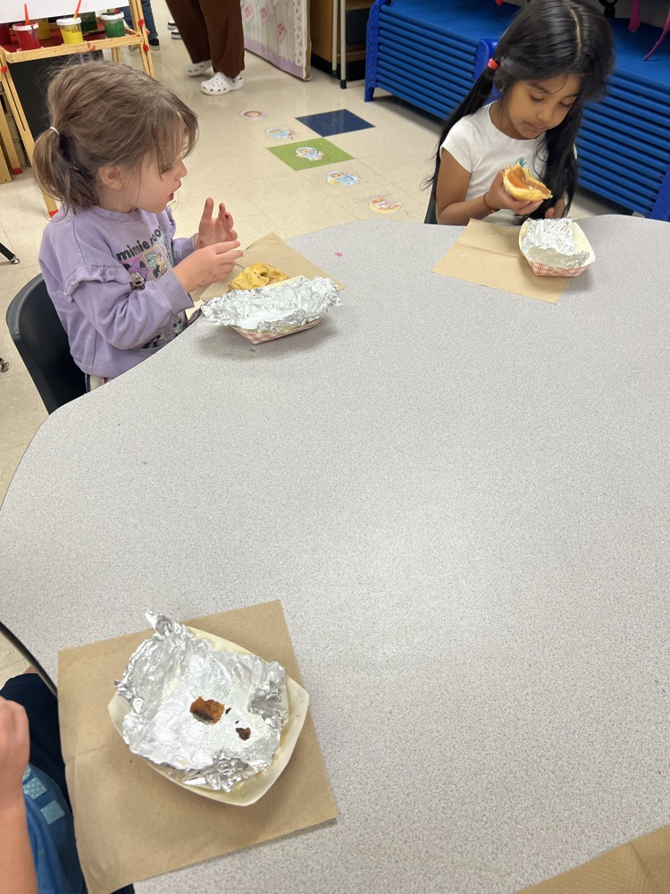 Pre-K students making apple pies with Mrs. Carver!