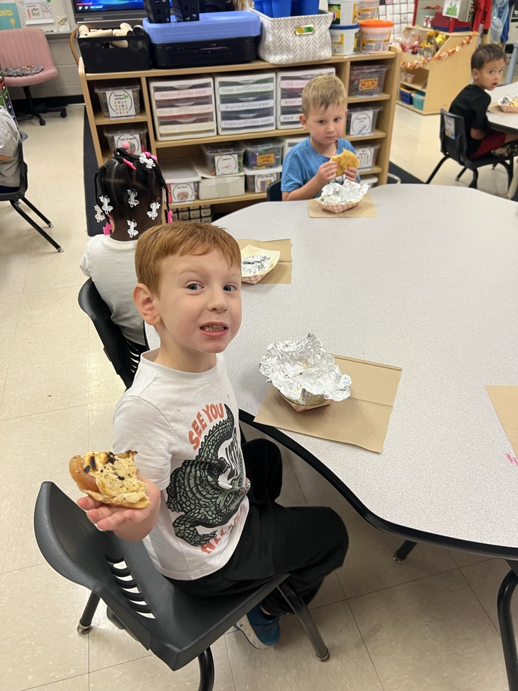 Pre-K students making apple pies with Mrs. Carver!
