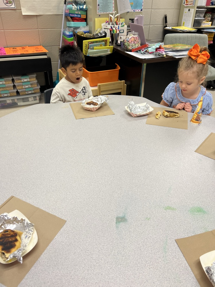 Pre-K students making apple pies with Mrs. Carver!