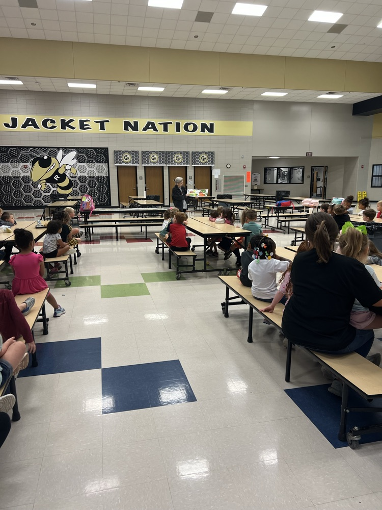 Ms. Lisa, our lead lunchroom lady, read to Pre-K for community helper week.