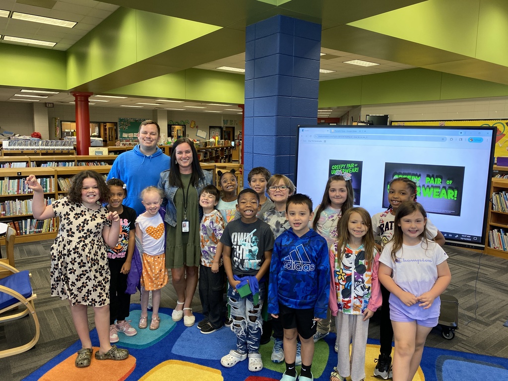 Mr. Bostwick's class posing with Mrs. Garcia after she read her book.