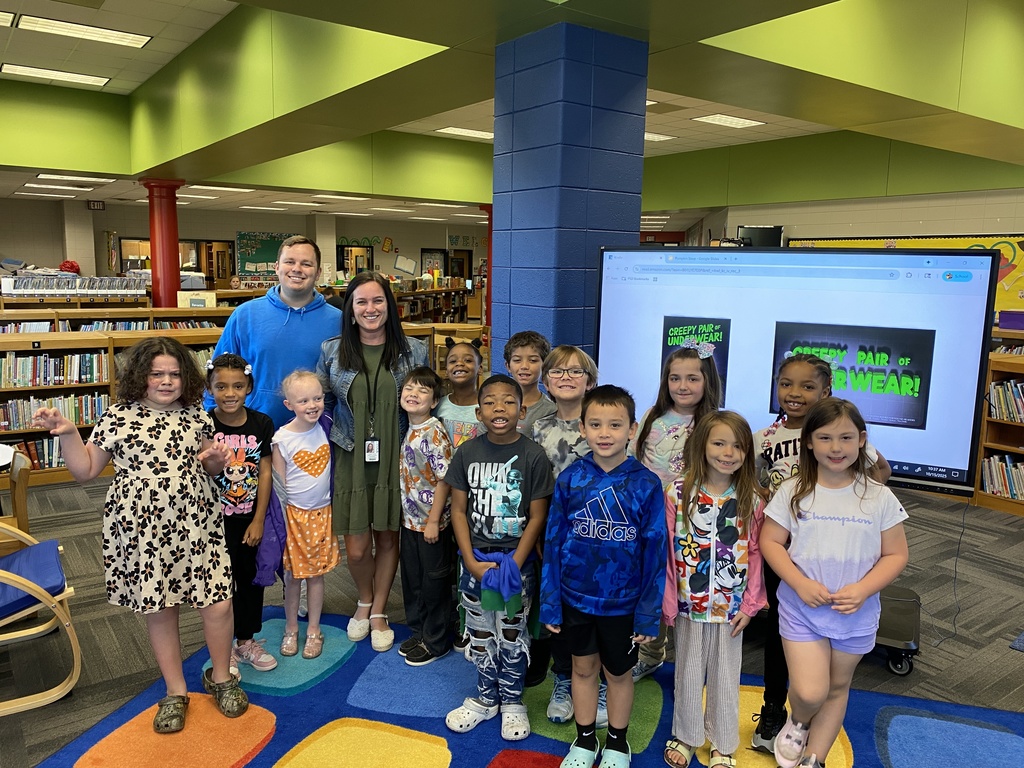 Mr. Bostwick's class posing with Mrs. Garcia after she read her book.
