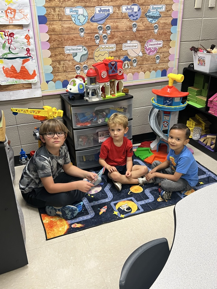 2nd grade reading to Pre-K