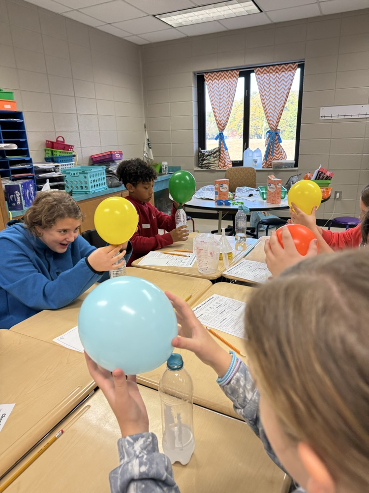 kids working on science experiment 