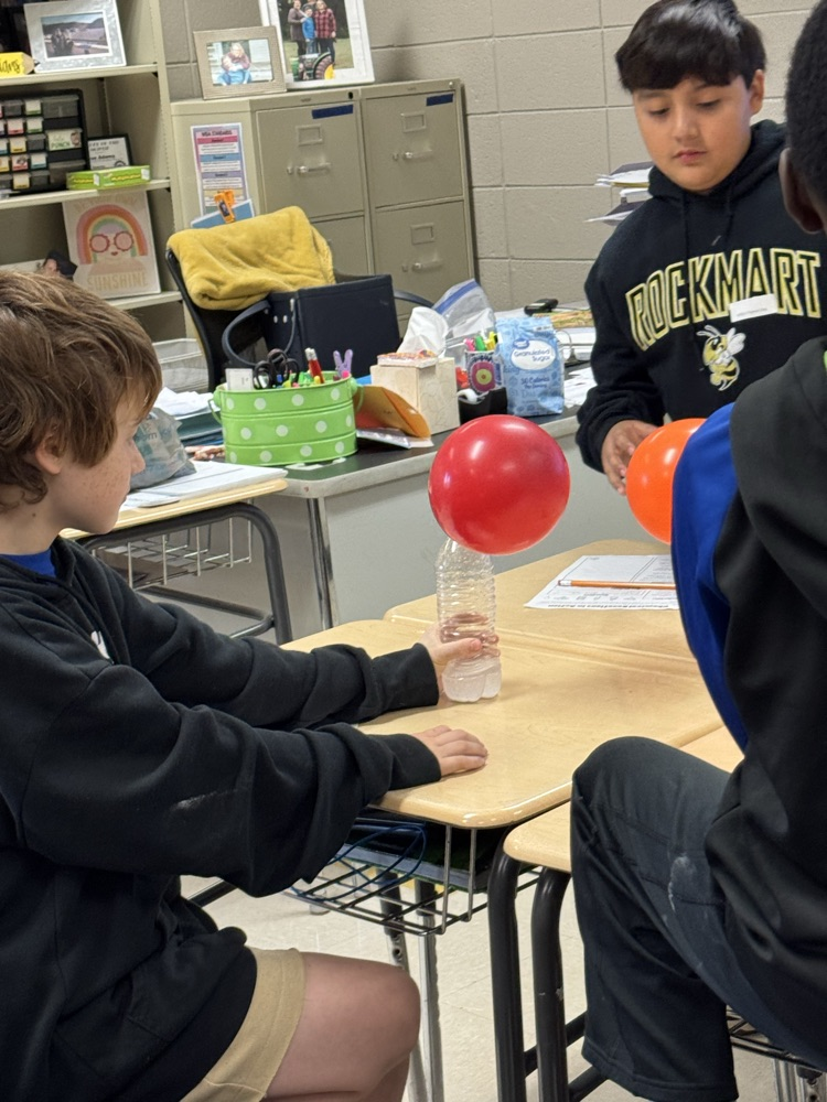 kids working on science experiment 