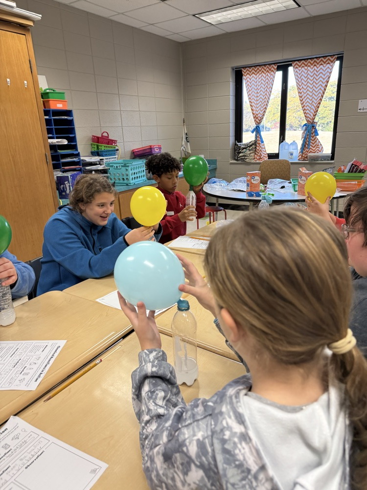 kids working on science experiment 