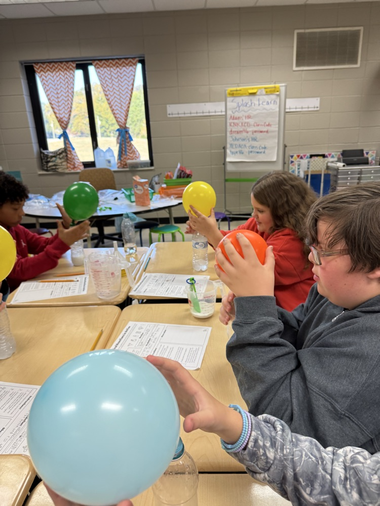 kids working on science experiment 