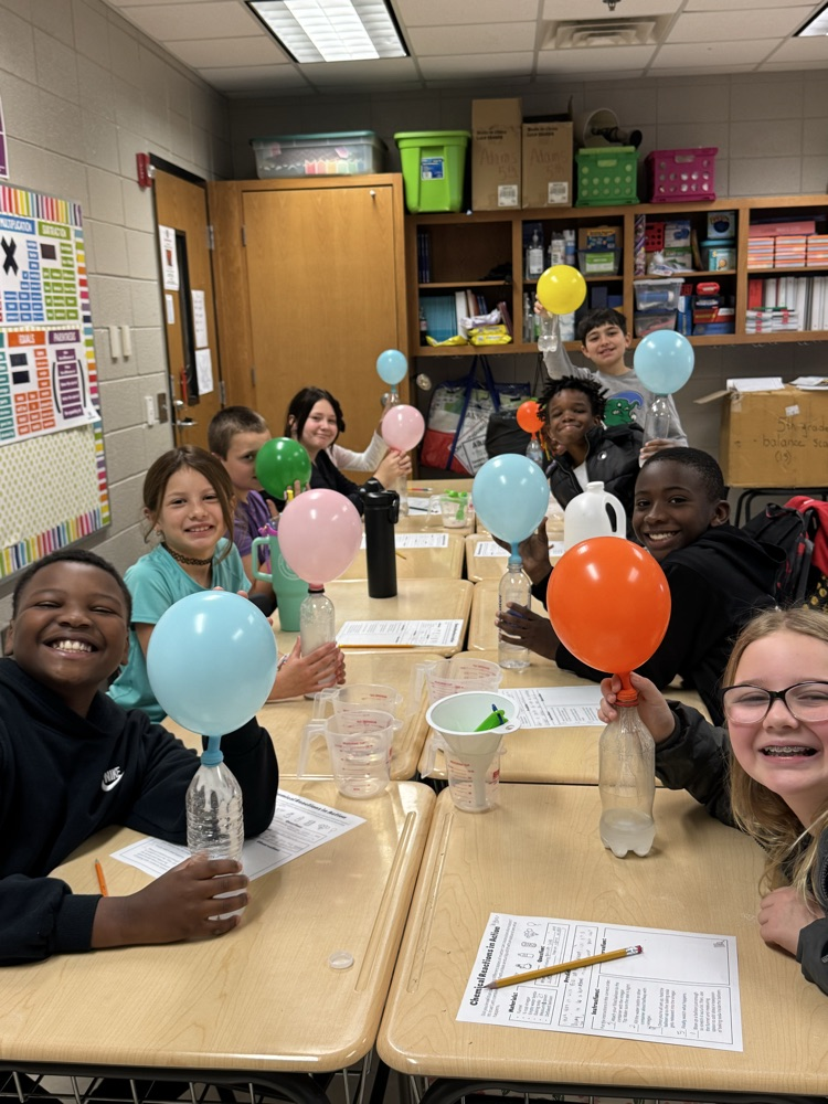 kids working on science experiment 
