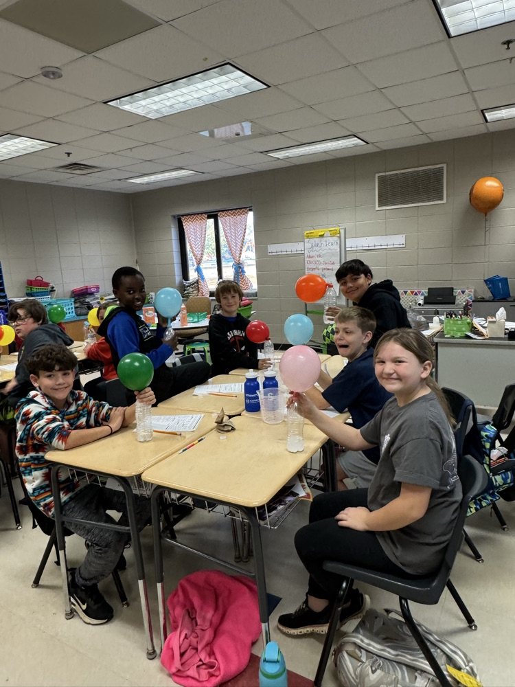 kids working on science experiment 