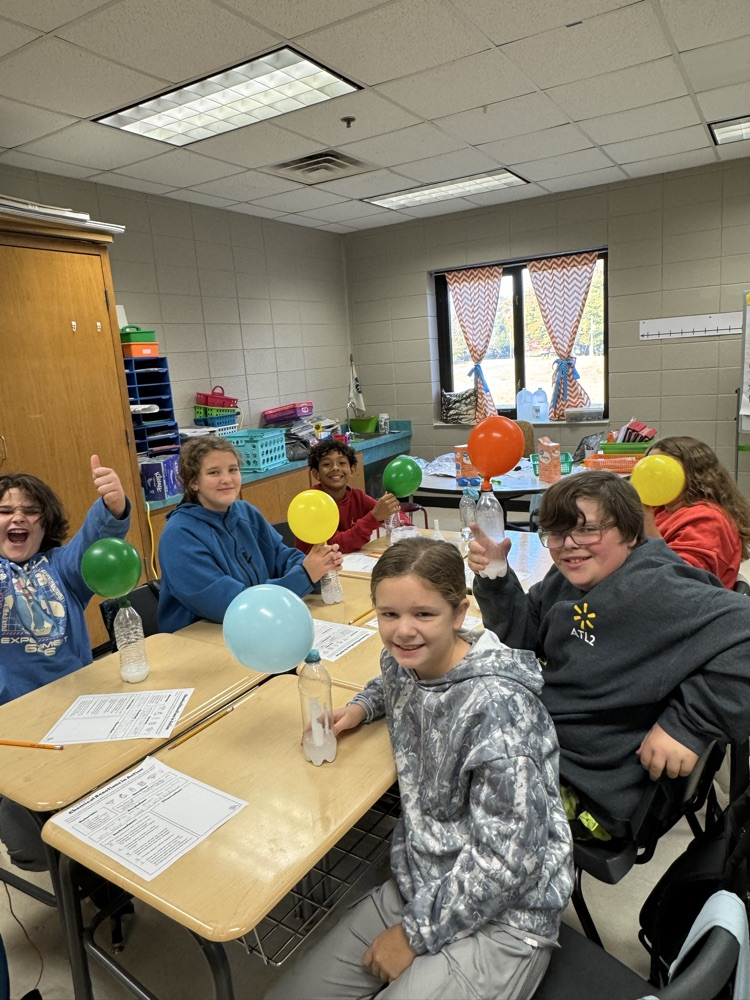 kids working on science experiment 