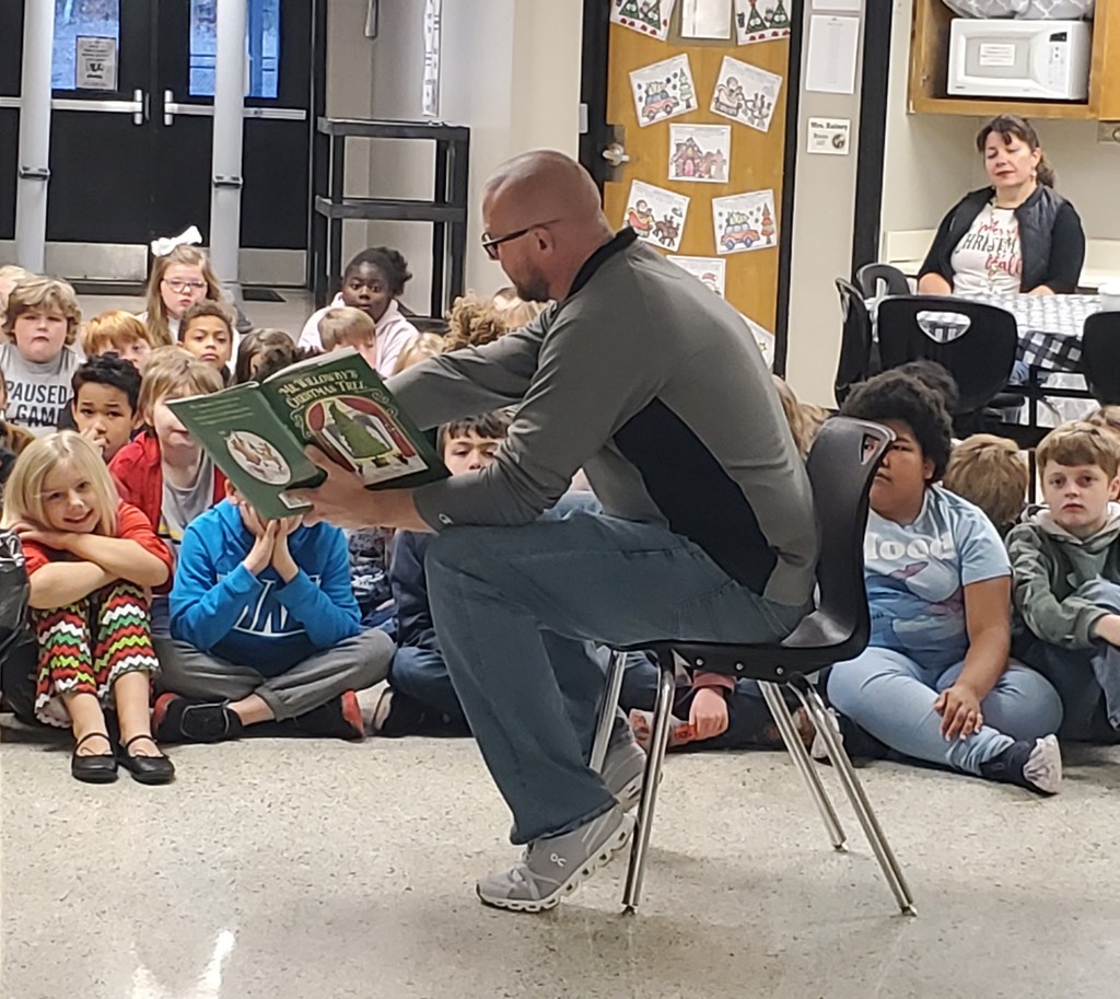 Mr Shepard reads to students