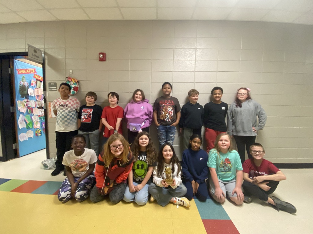 4th grade's AR Challenge - Congratulations to Van Wert Elementary's 4th grade team for winning December's AR challenge with Eastside.  Picture is of a 4th grade class posing with the GOAT trophy.