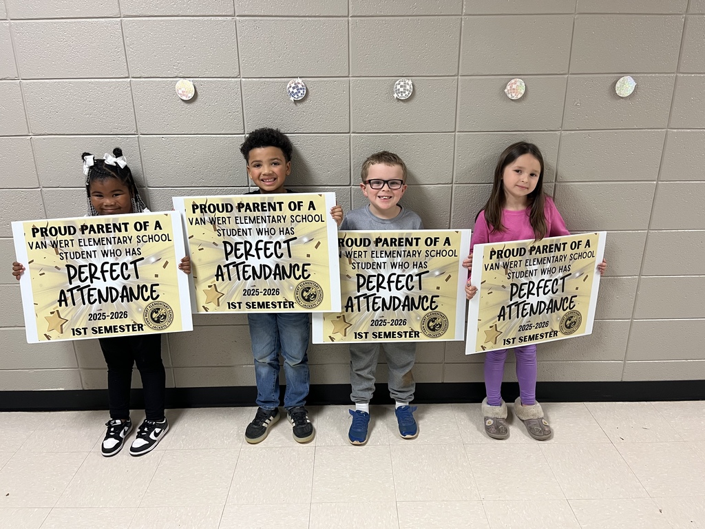 Picture is of our kindergarten perfect attendance students smiling for the camera. 