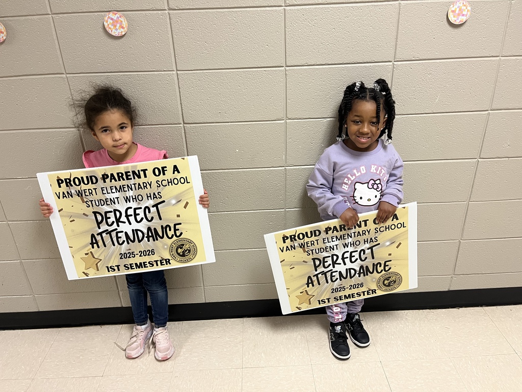 Picture is of our pre-k perfect attendance students smiling for the camera. 