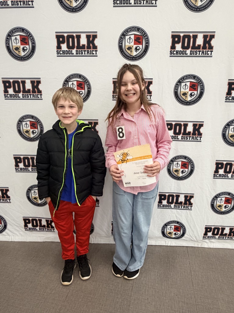 Congratulations to Ms. Anna Shepard. She is PSD's runner up, placing 2nd in today's spelling. She's posing with James Odom, Van Wert's alternate.
