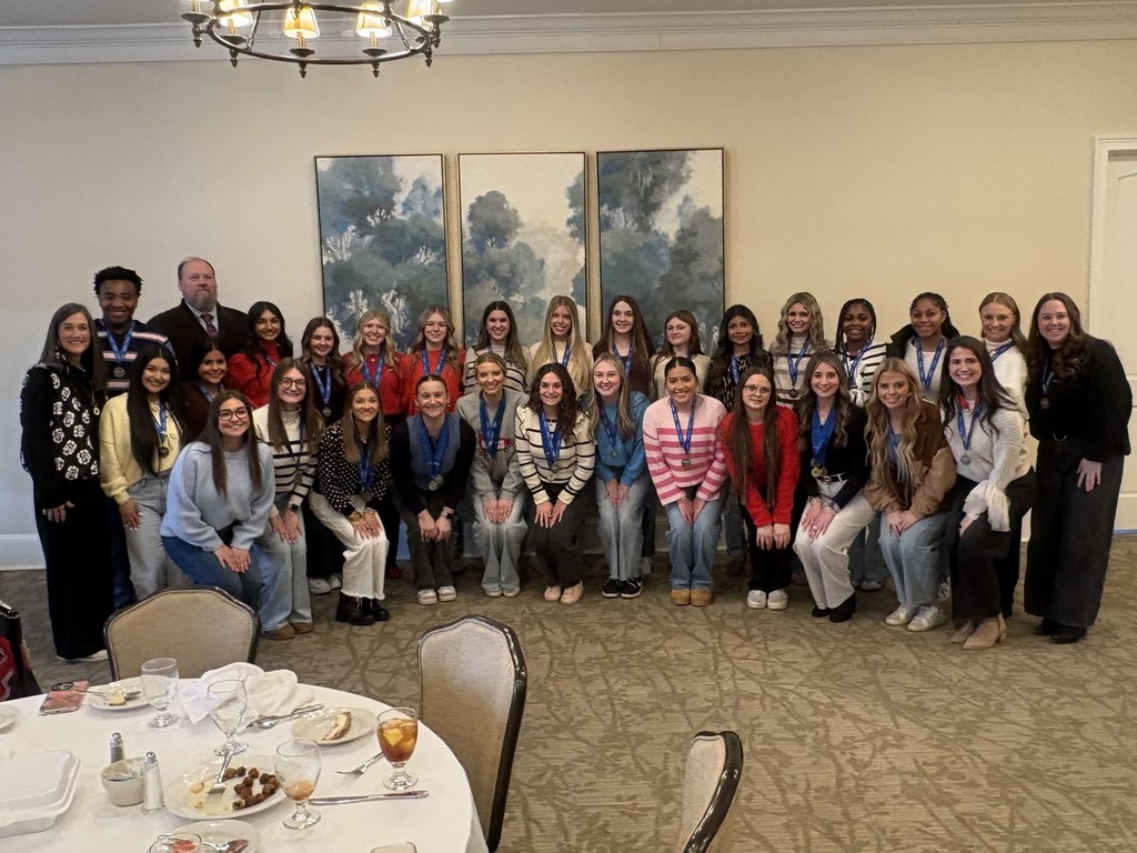 CHS Game Day cheerleaders and coach, Mrs. Bridgett Tillery, Mr. Scott Wilson