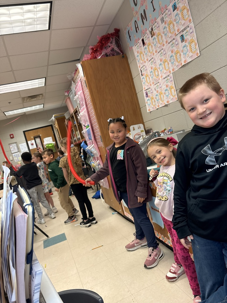 Dr. Bob visited 1st grade yesterday. #scienceisfun #learningisfun picture of students experimenting with sound 