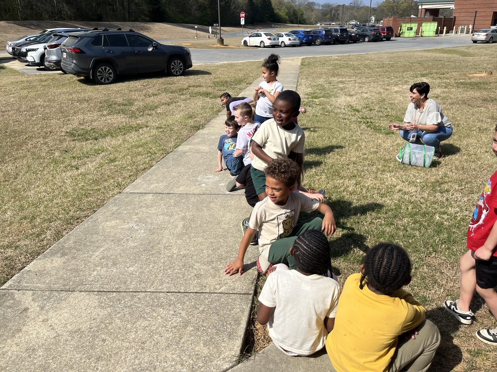 Mrs. Stringer and Ms. MJ’s class found an injured butterfly last week on the playground. They put it in the “butterfly hospital” and fed it fresh fruit each day to help it recover and grow stronger. The kids were able to release “Bo” the butterfly today and he was able to fly high into the trees.  Picture of the kids in Ms. Stringer's class.