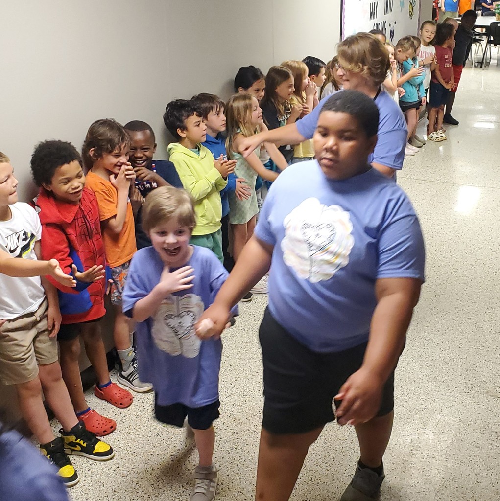 Students walking through the hall