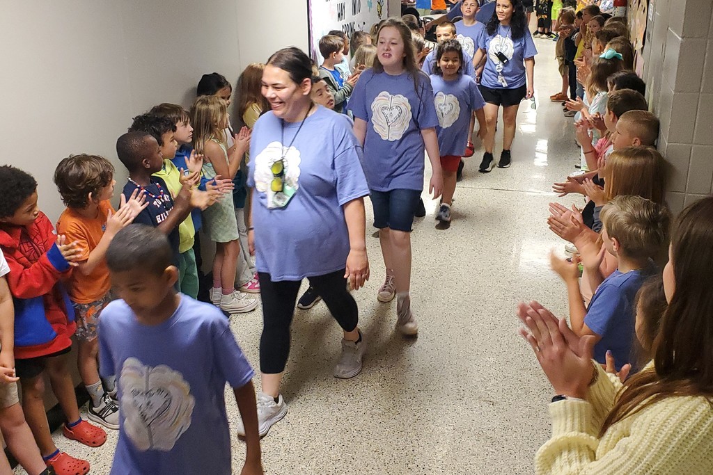 Students walking through the hall