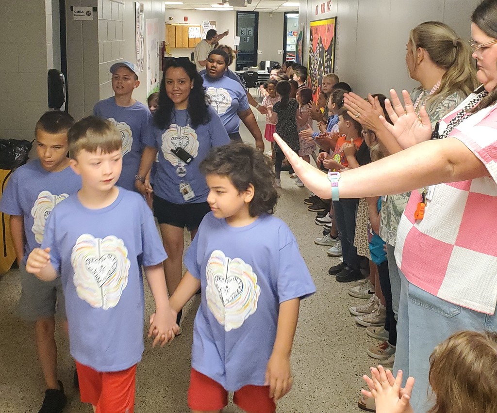 Students walking through the hall