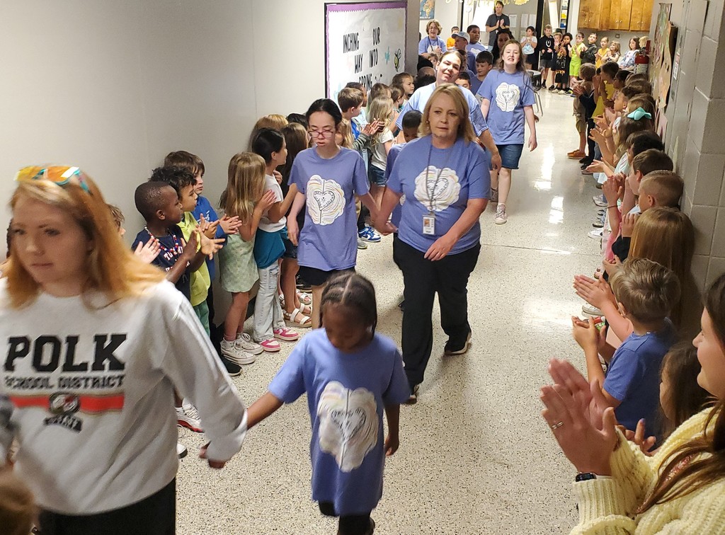 Students walking through the hall
