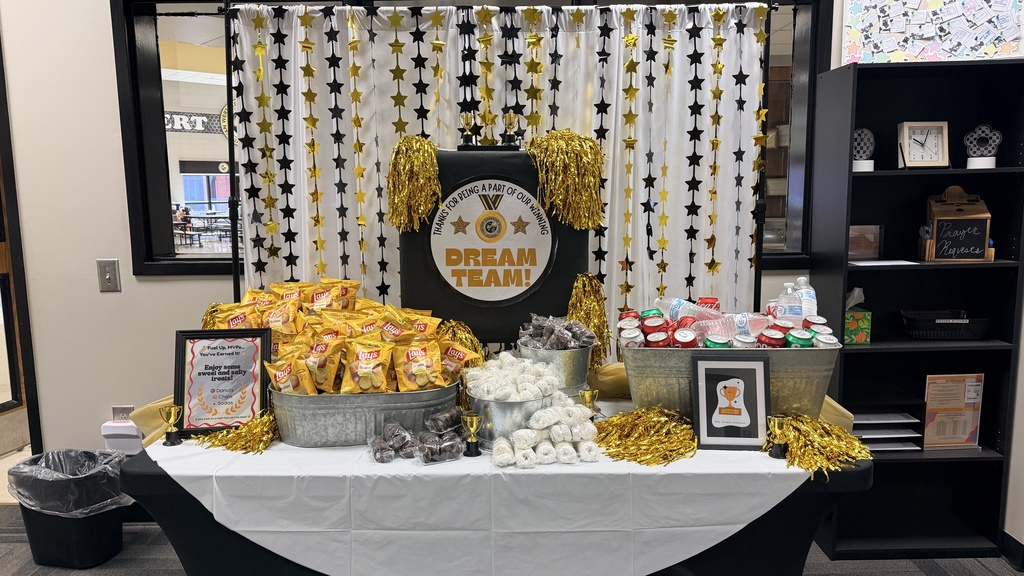 Thank you to our wonderful administrators and office staff for making the first two days of Teacher Appreciation Week so much fun! We thoroughly enjoyed El Coyote yesterday, and the snacks today were golden. #TeacherAppreciationWeek.  Picture of the backdrop with the donuts and snacks on a table. 