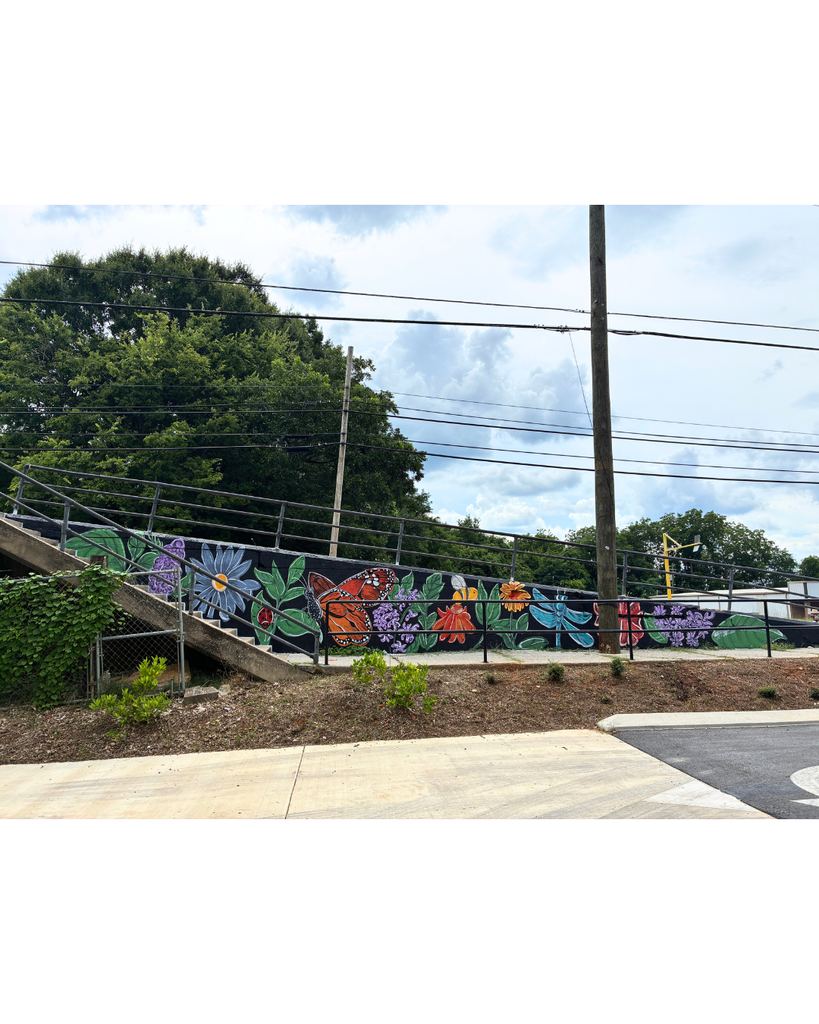 Advanced Art students/mural behind the Langford Center