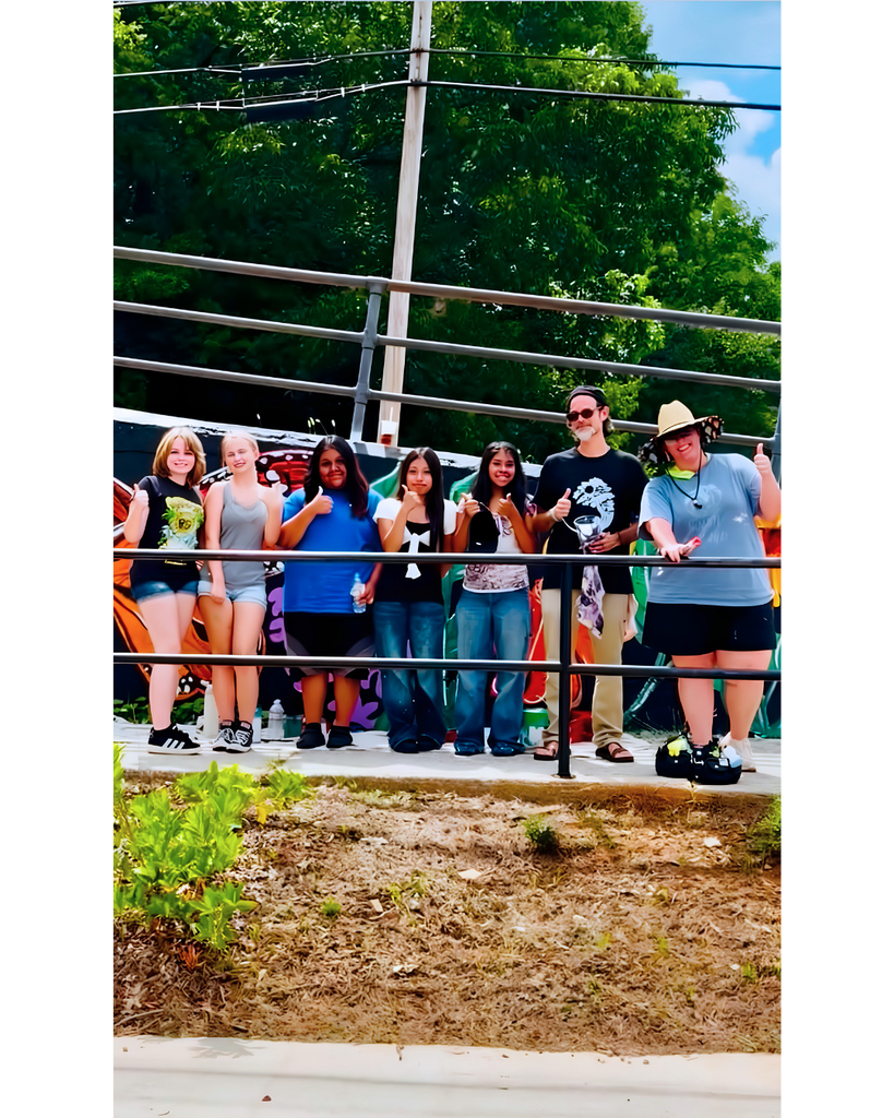 Advanced Art students/mural behind the Langford Center