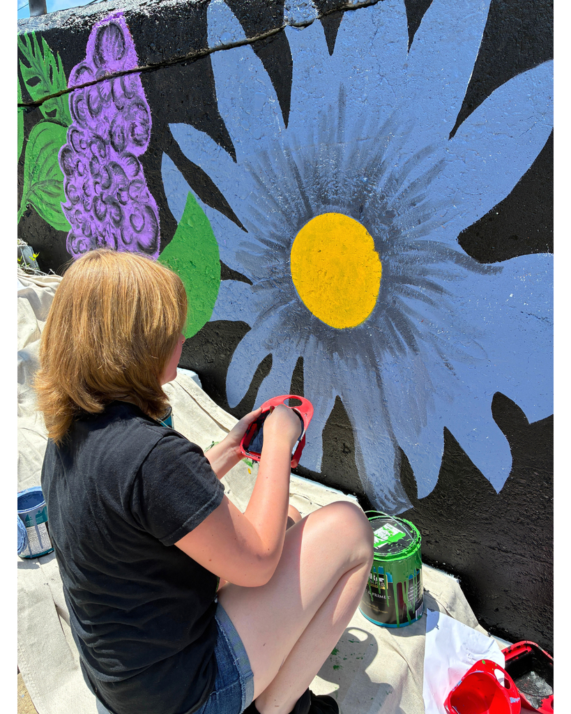 Advanced Art students/mural behind the Langford Center