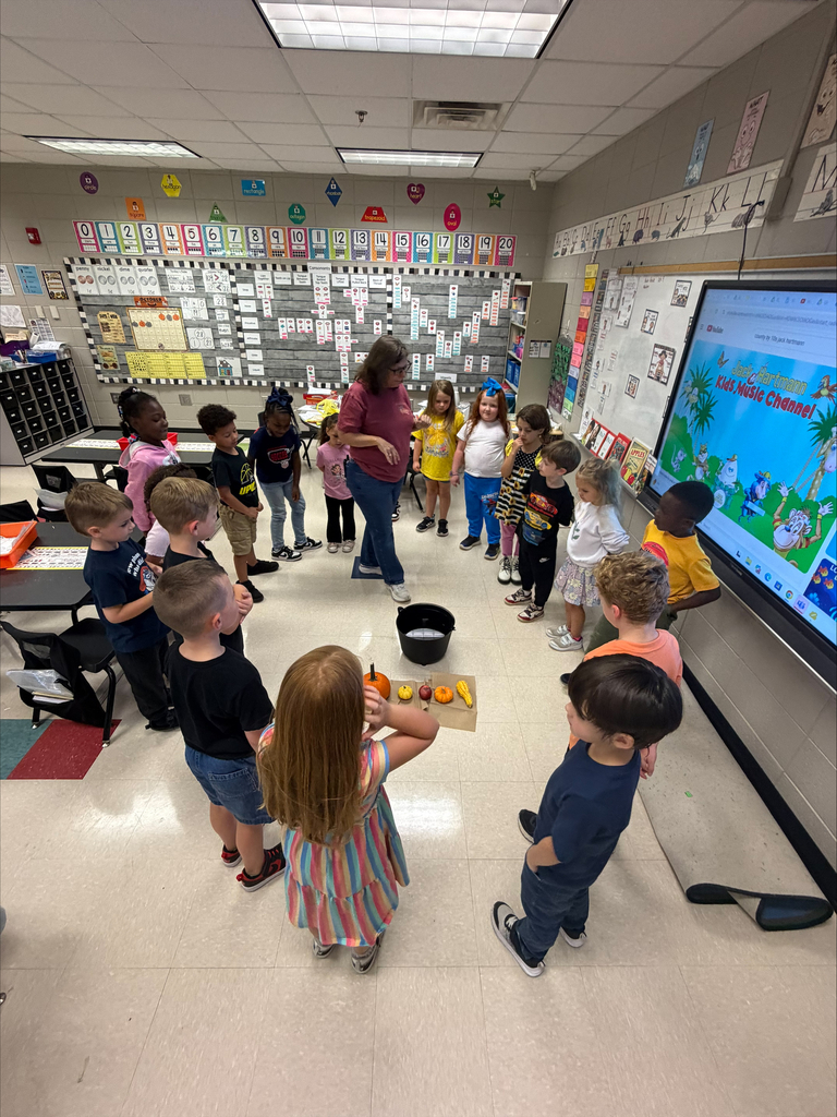 Ms. Ring's kindergarten class is having lots of fun learning about labeling and which objects sink or float.