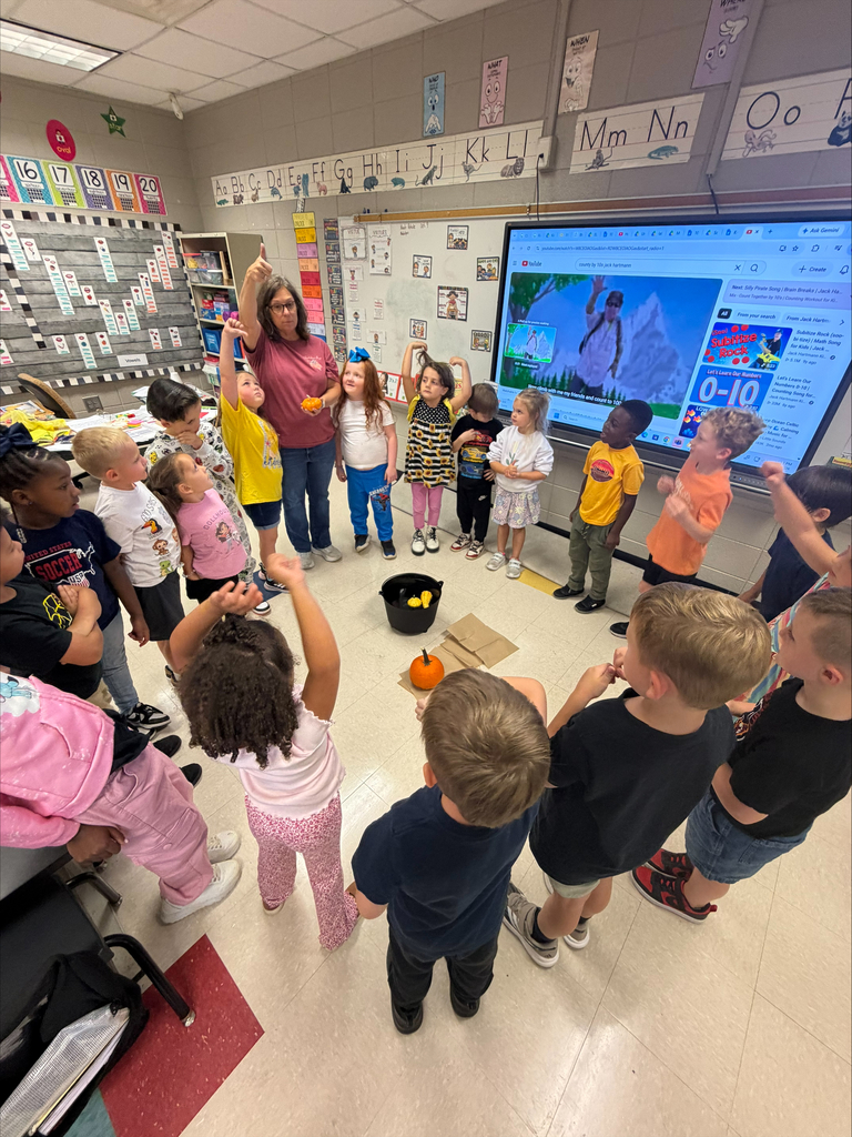 Ms. Ring's kindergarten class is having lots of fun learning about labeling and which objects sink or float.