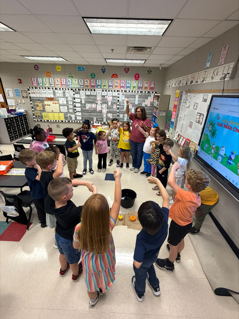 Ms. Ring's kindergarten class is having lots of fun learning about labeling and which objects sink or float.