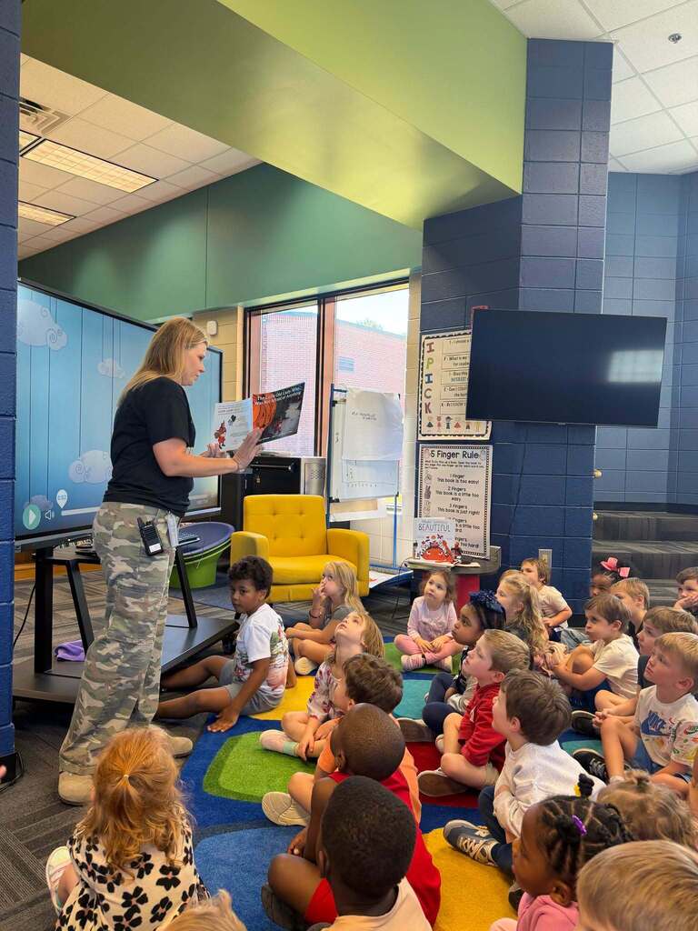 Picture is of our assistant principal reading to our prek students for prek week in georgia.