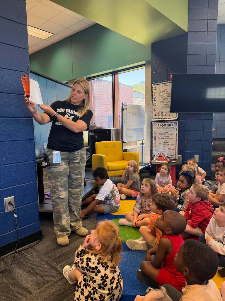 Picture is of our assistant principal reading to our prek students for prek week in georgia.