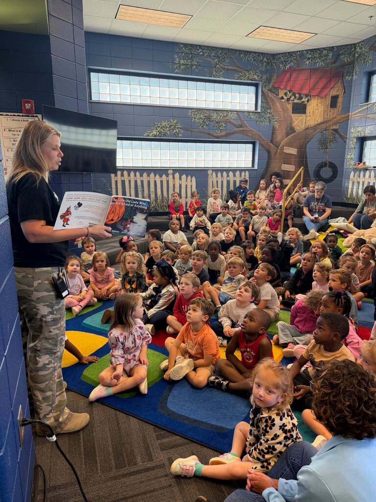 Picture is of our assistant principal reading to our prek students for prek week in georgia.