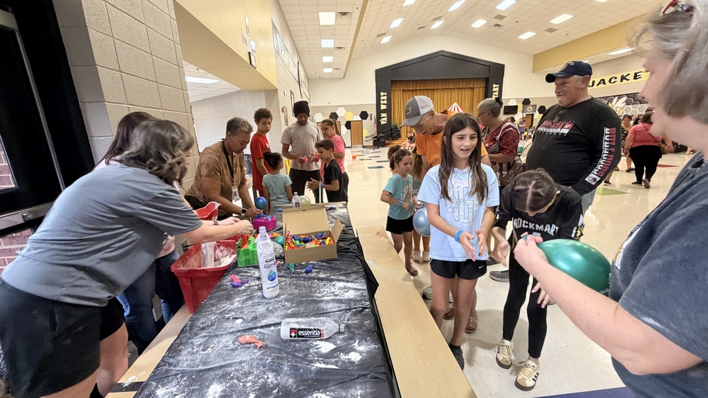 Kids making squishes with flour and balloons. 🍂🔬💛 What a FANTASTIC STEM Fall Carnival Night at Van Wert Elementary School! 🖤🐝 A huge THANK YOU to Mrs. Garcia for leading last night's events, and thank you to our wonderful parents, family members, and community members who joined us yesterday for an evening of STEM learning, fall fun, and unforgettable memories! 🎃🧪🍁