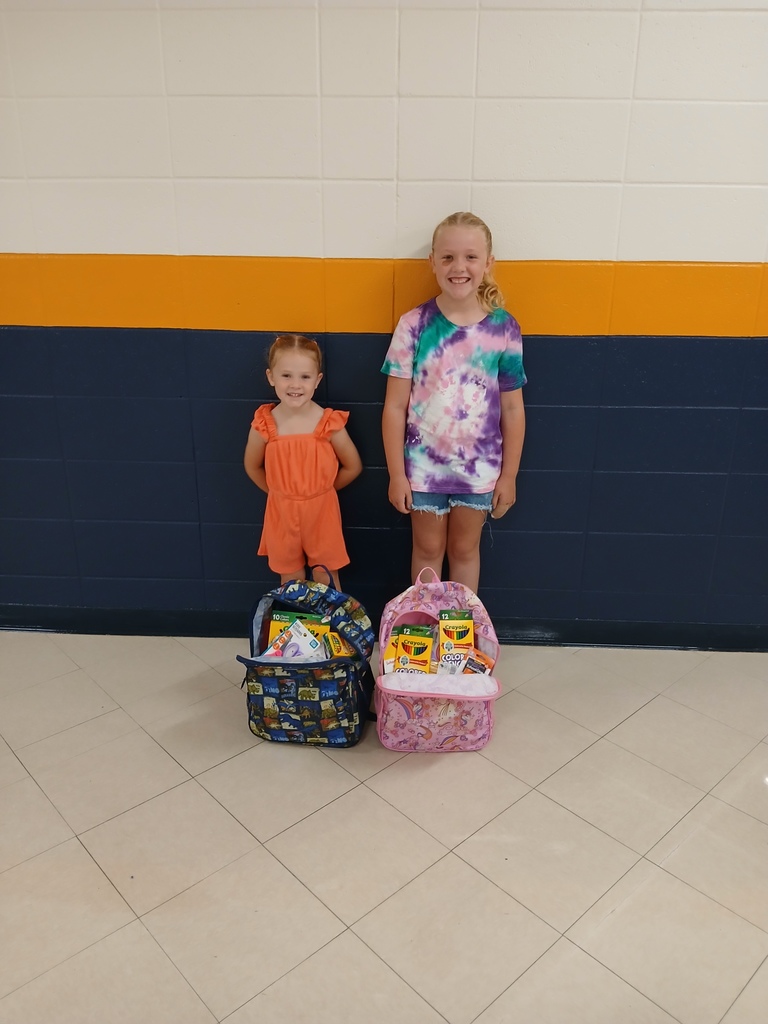 Carly and Ava with their donations to CN