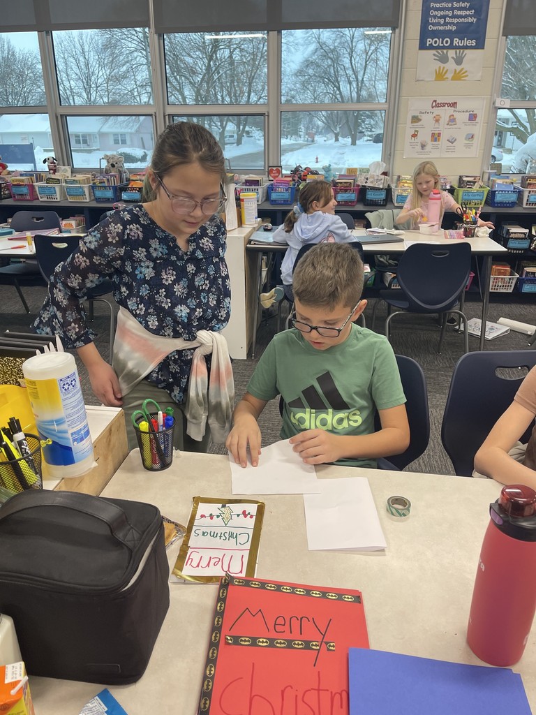 The 4th-grade students made cards for service members who can’t be with their families during the holidays.