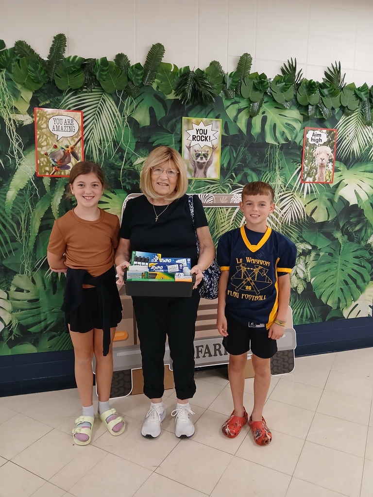 Two of our fifth -grade students helped carry in school donations from Pine Creek Christian Church 