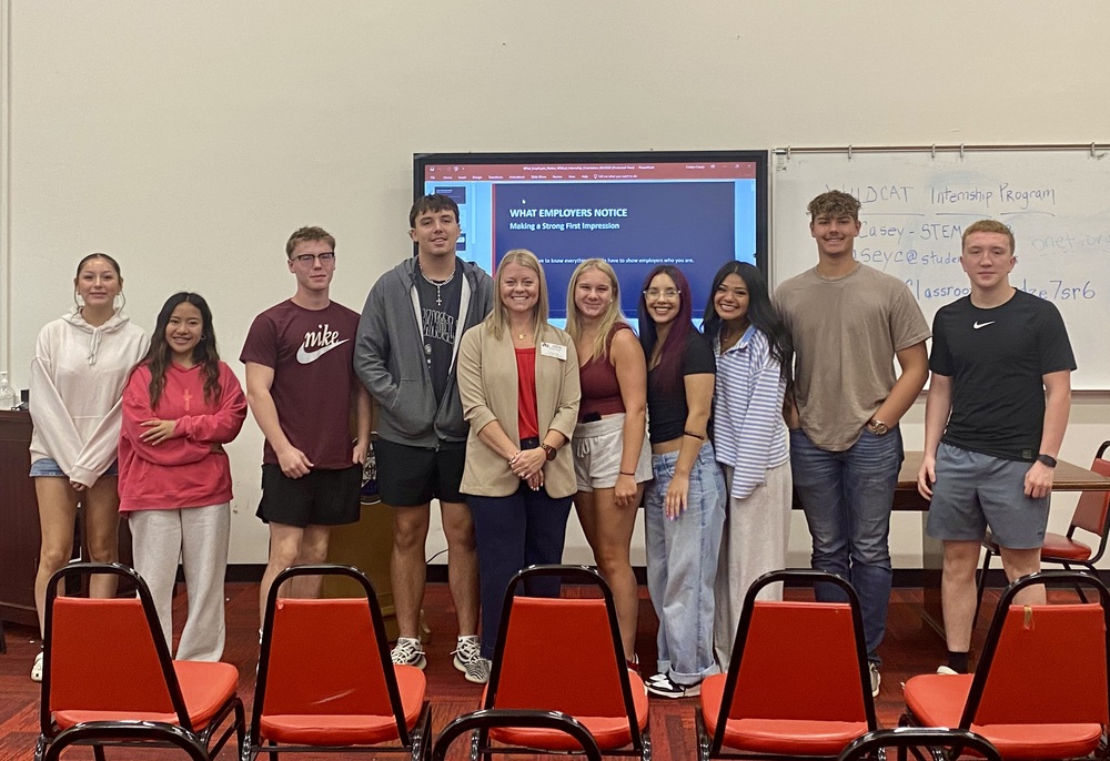 Photo of students with guest speaker
