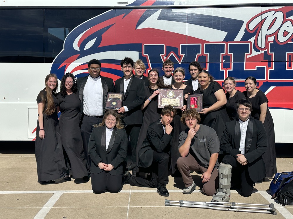 Students with their awards after the orchestra contest