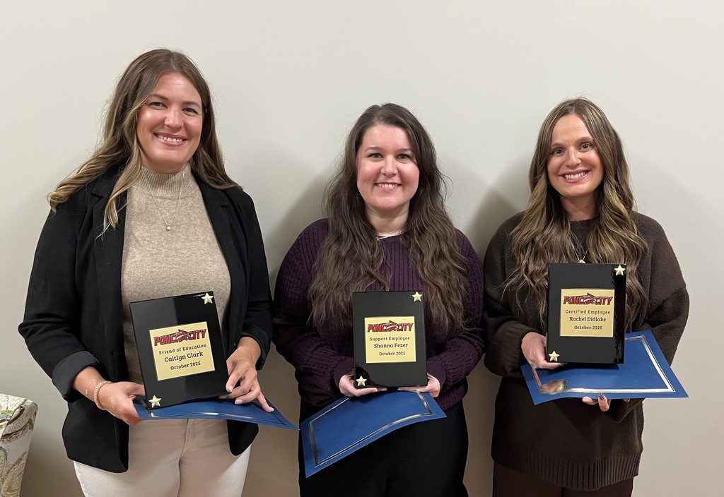 Each awardee pictured (left to right) are Caitlyn Clark, Friend of Education; Shanna Fezer, Support Employee of the Month; and Rachel Didlake, Certified Employee of the Month.