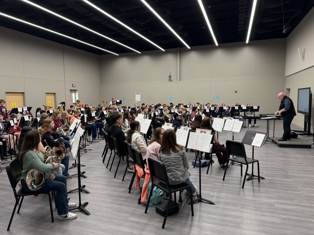 Another school's band practicing in a classroom