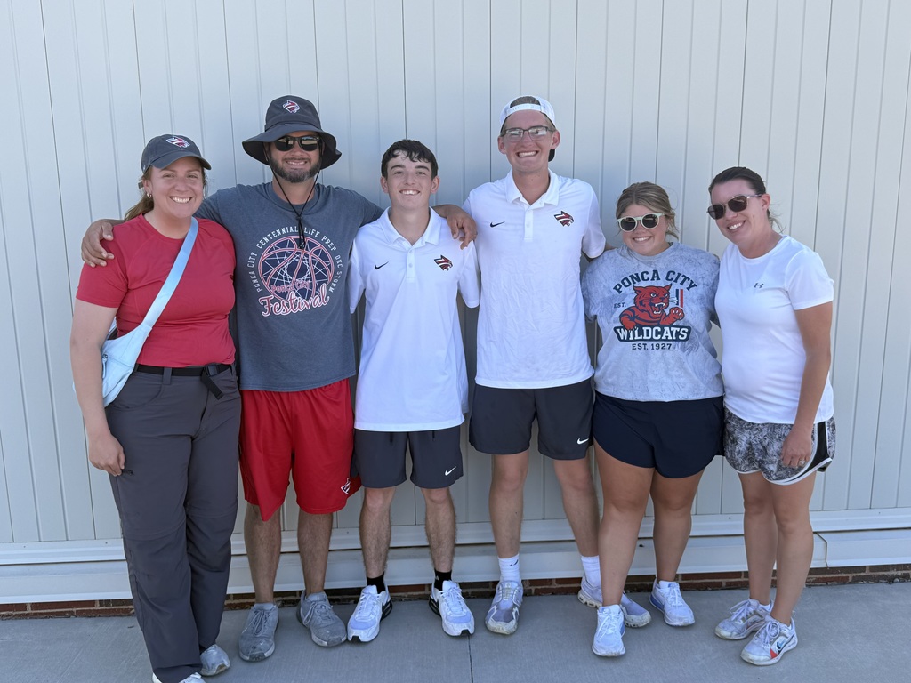 Tennis state qualifiers with their coaches