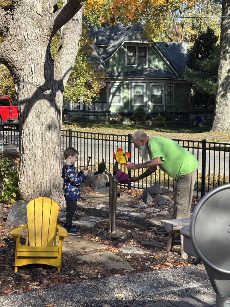 A boy and his grandpa play musical instruments