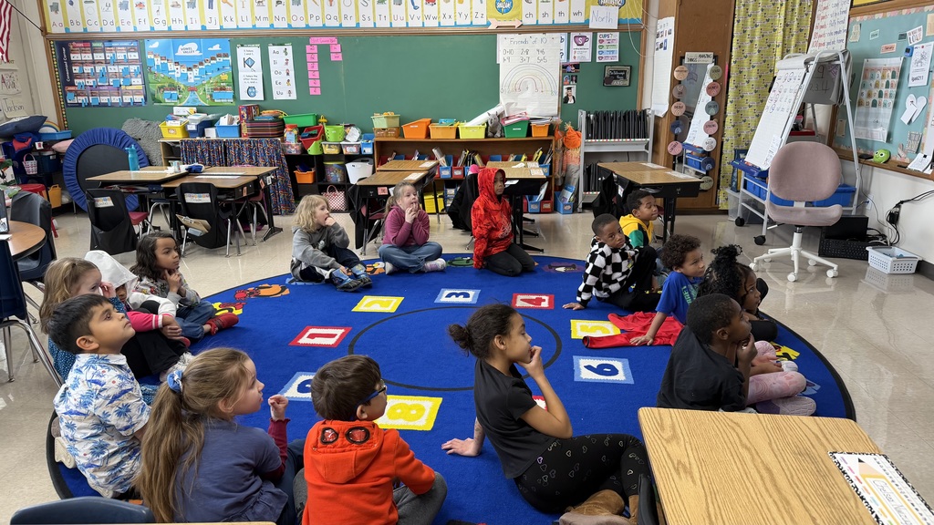 Students learning about dairy farms and their adopted cow. 