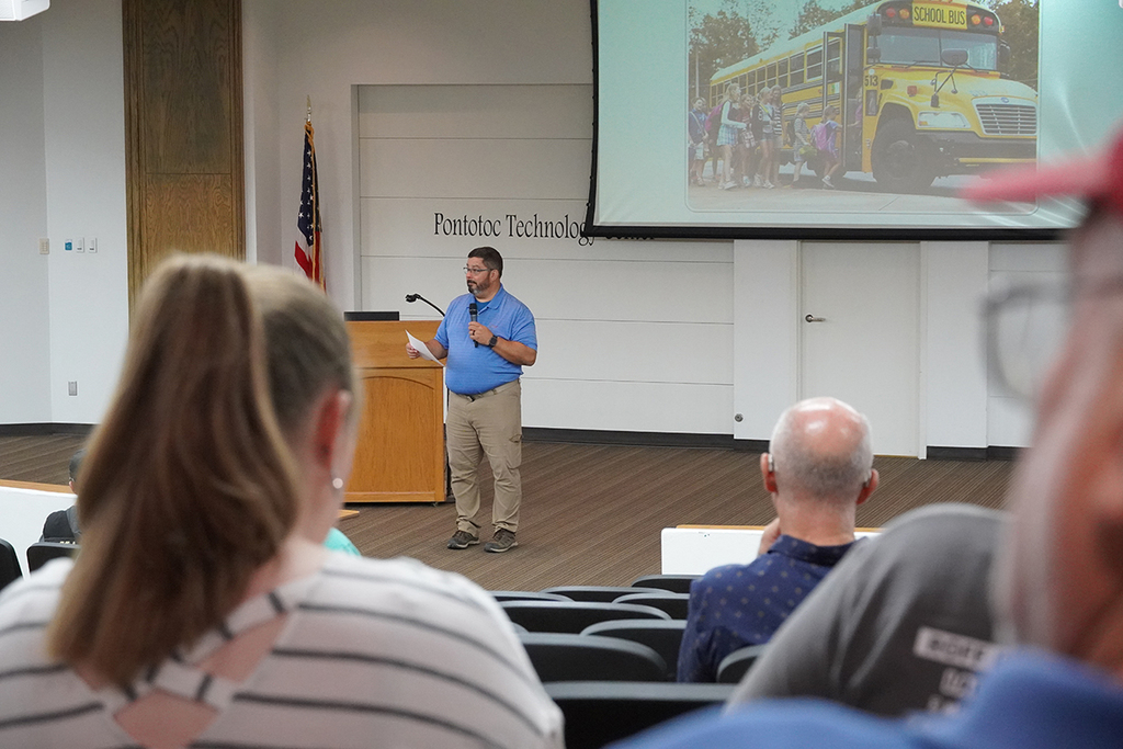 Mike Tuley addressing attendees in the seminar center