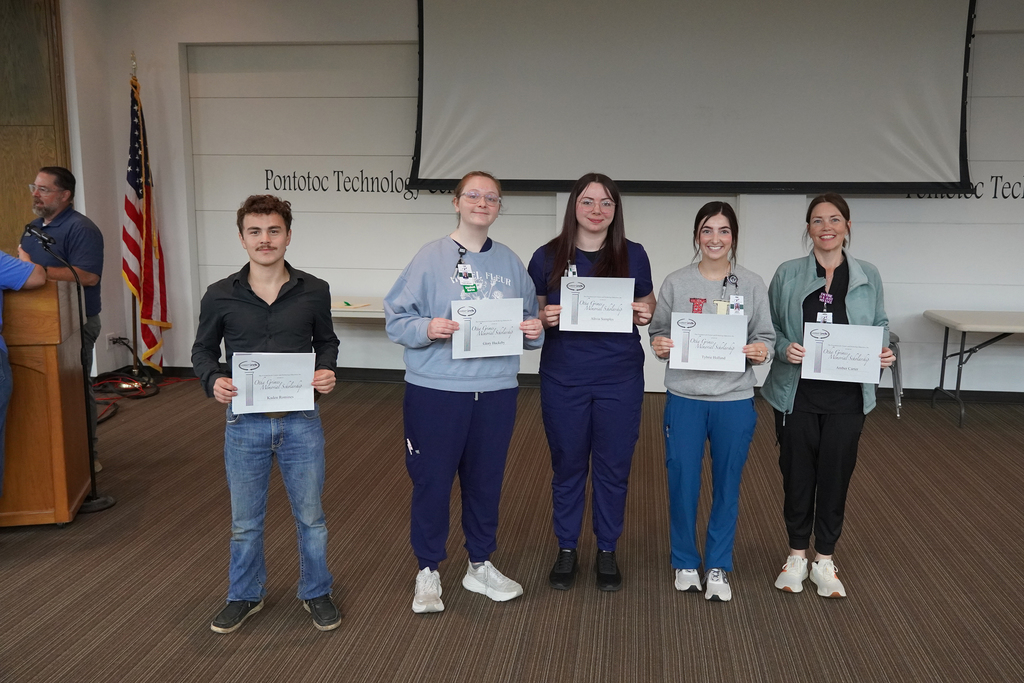 Five students standing and holding certificates.